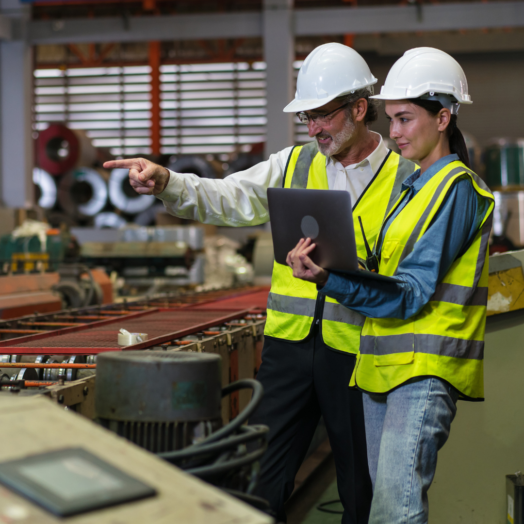WHS trends 2026 as project managers review safety standards and compliance during a factory inspection