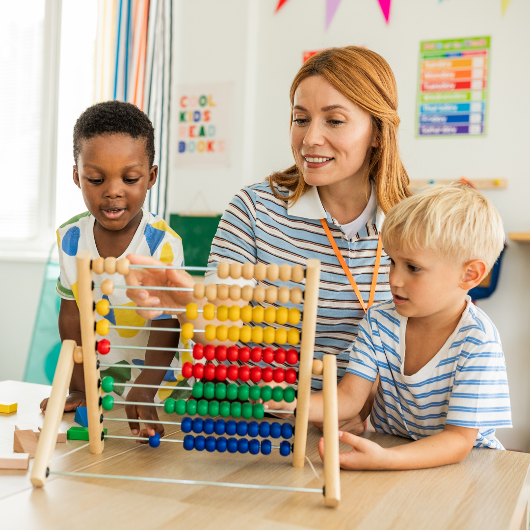 Early childhood educator supporting children through play based learning activities